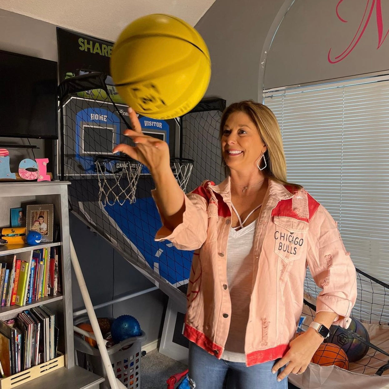 Randi Mahomes in her 'GO BULLS' Denim Jacket