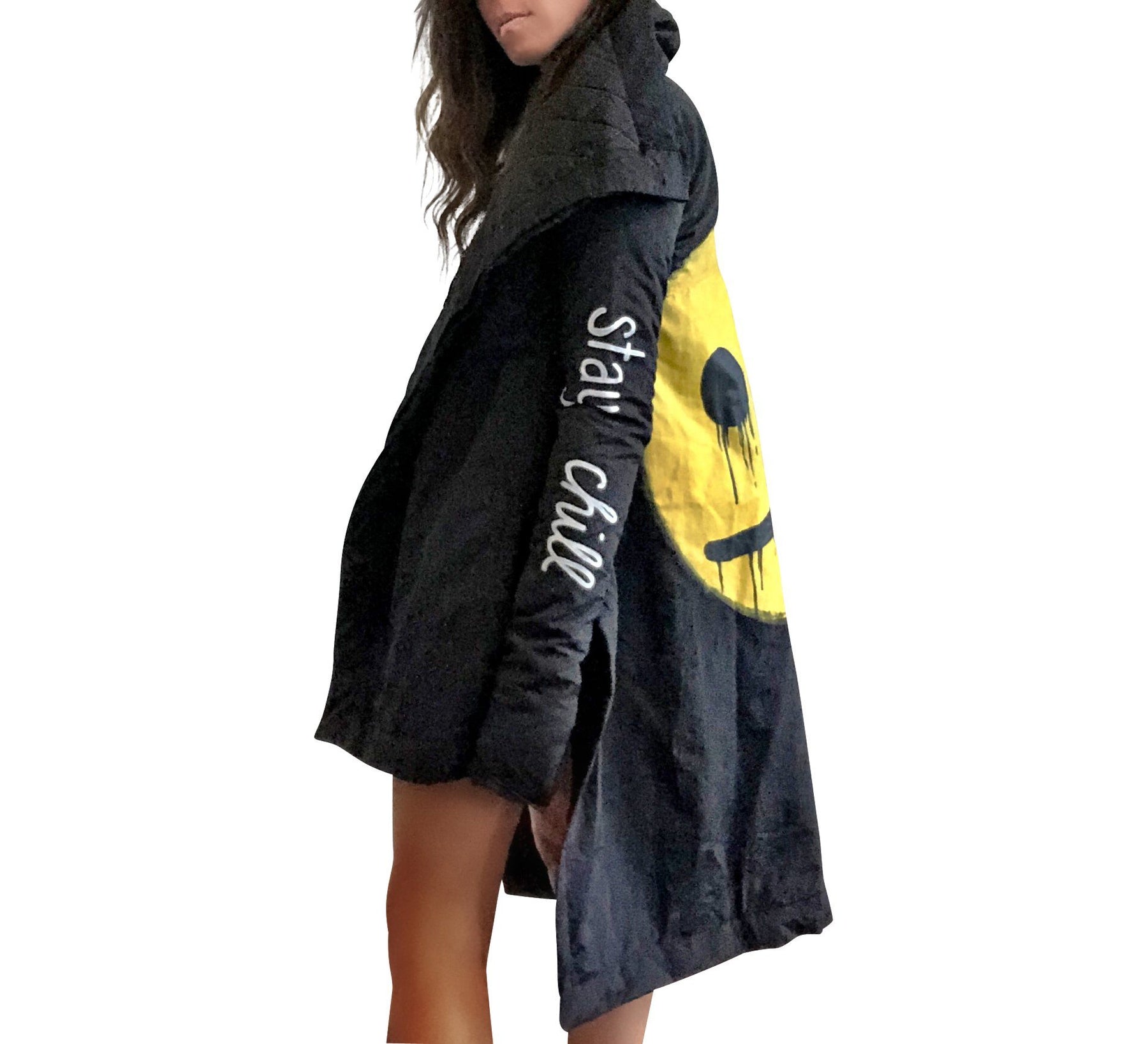 The COOLEST puffer jacket. Large smiley painted on back in yellow, with black drip eyes and mouth. STAY CHILL painted in white on sleeve. Signed @wrenandglory.