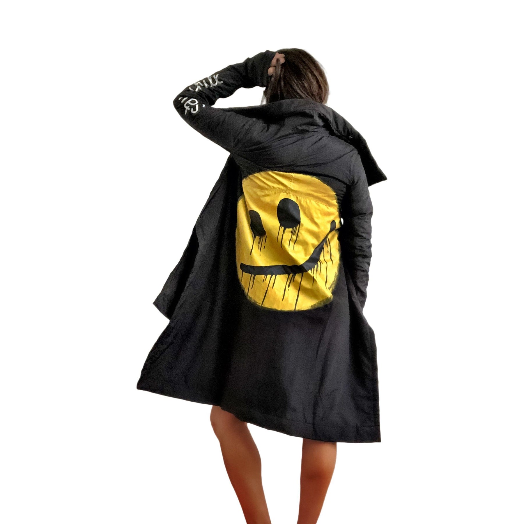 The COOLEST puffer jacket. Large smiley painted on back in yellow, with black drip eyes and mouth. STAY CHILL painted in white on sleeve. Signed @wrenandglory.