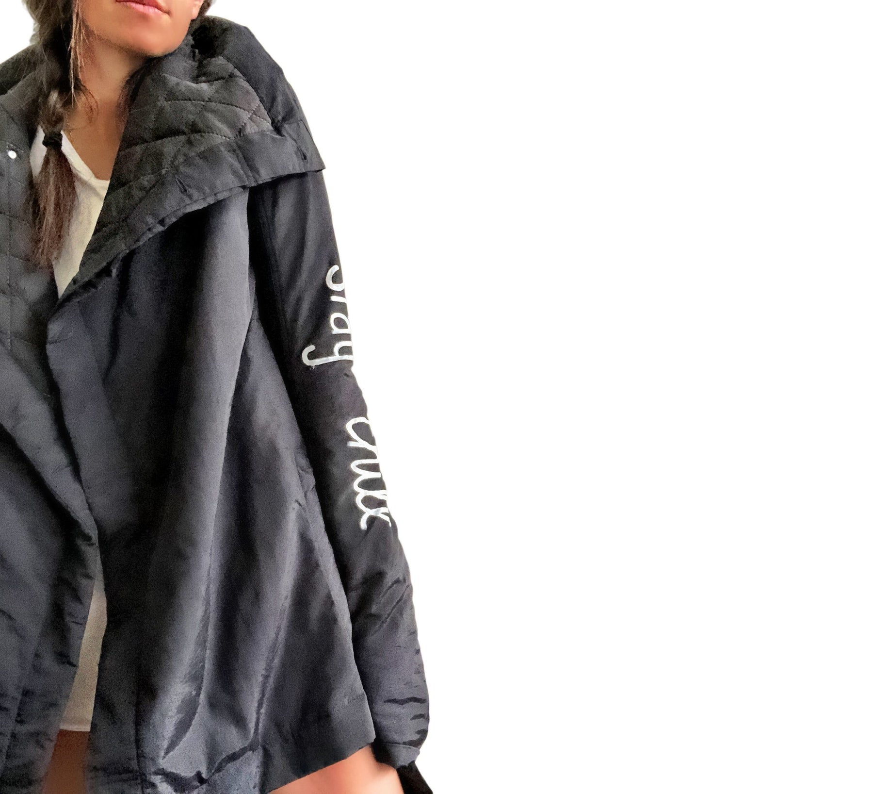 The COOLEST puffer jacket. Large smiley painted on back in yellow, with black drip eyes and mouth. STAY CHILL painted in white on sleeve. Signed @wrenandglory.