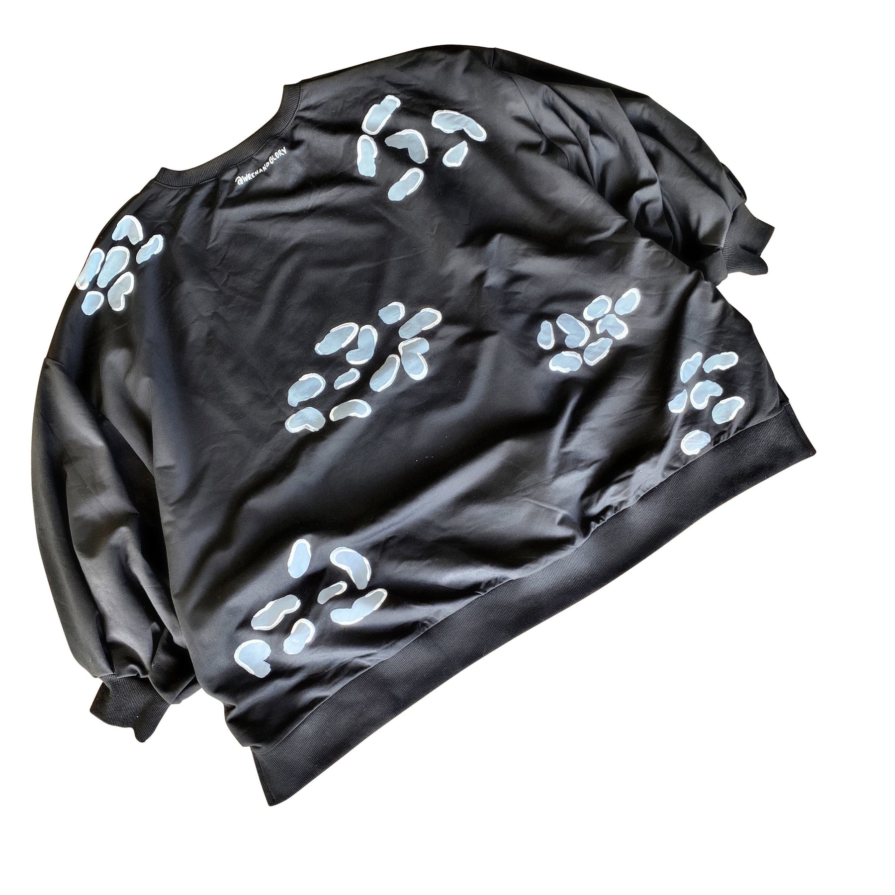 Oversized black crewneck sweatshirt. Panther pattern painted throughout in gray and white. Signed @wrenandglory.