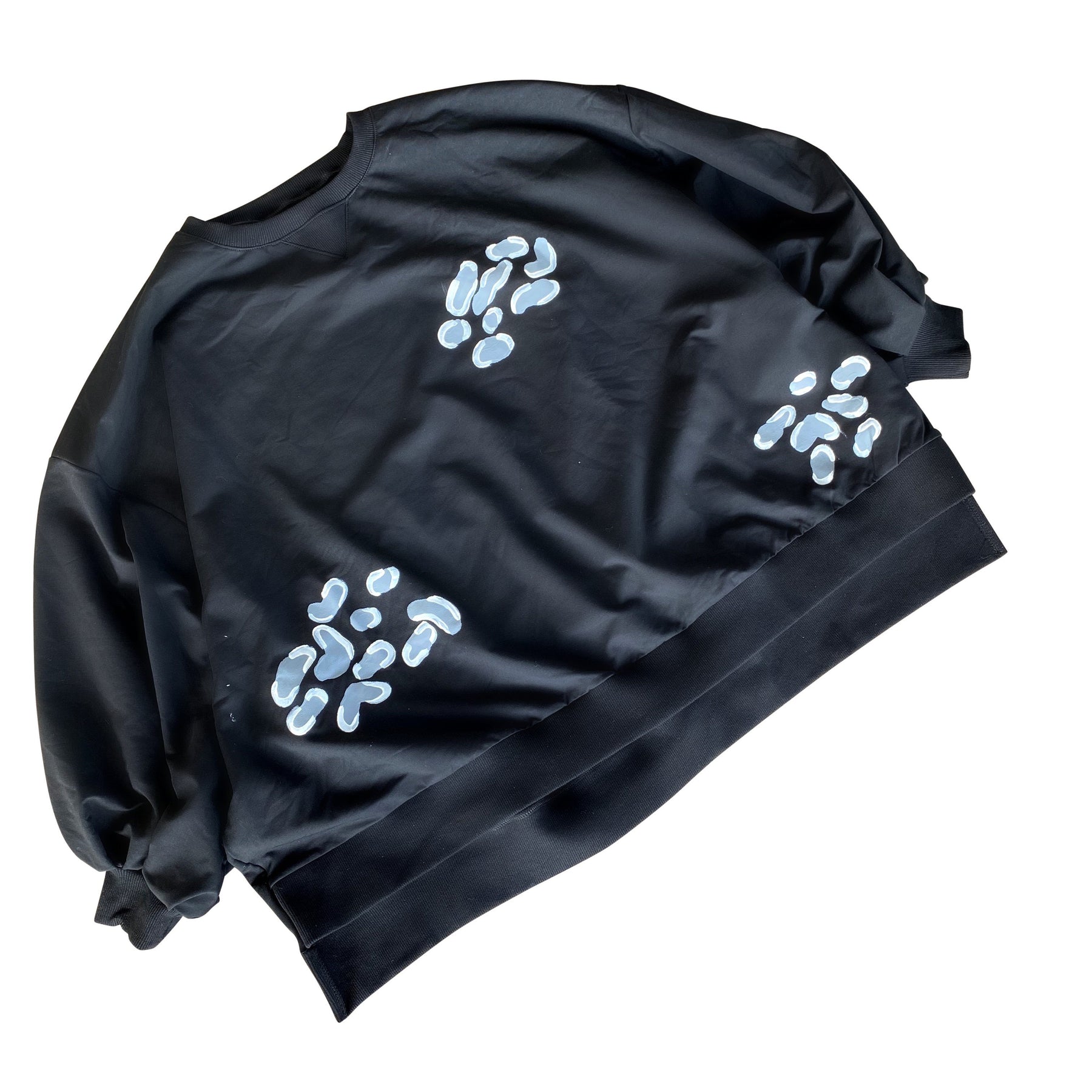 Oversized black crewneck sweatshirt. Panther pattern painted throughout in gray and white. Signed @wrenandglory.