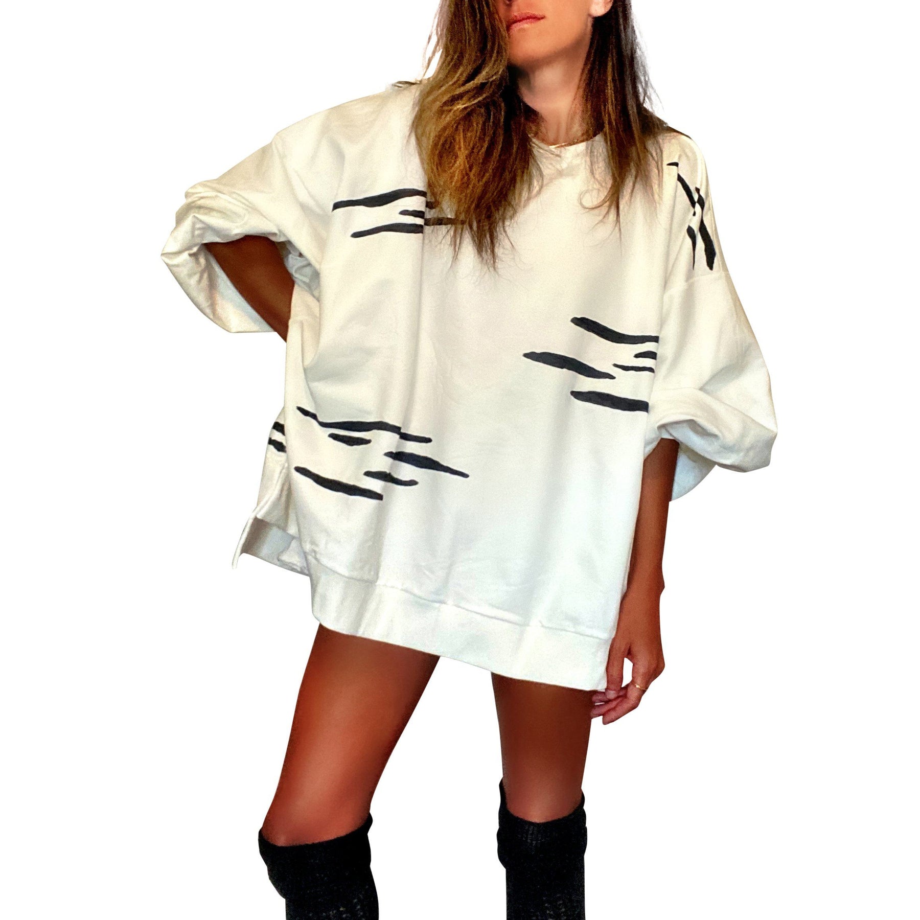 Oversized white crewneck sweatshirt. Zebra pattern painted throughout in black. Signed @wrenandglory.