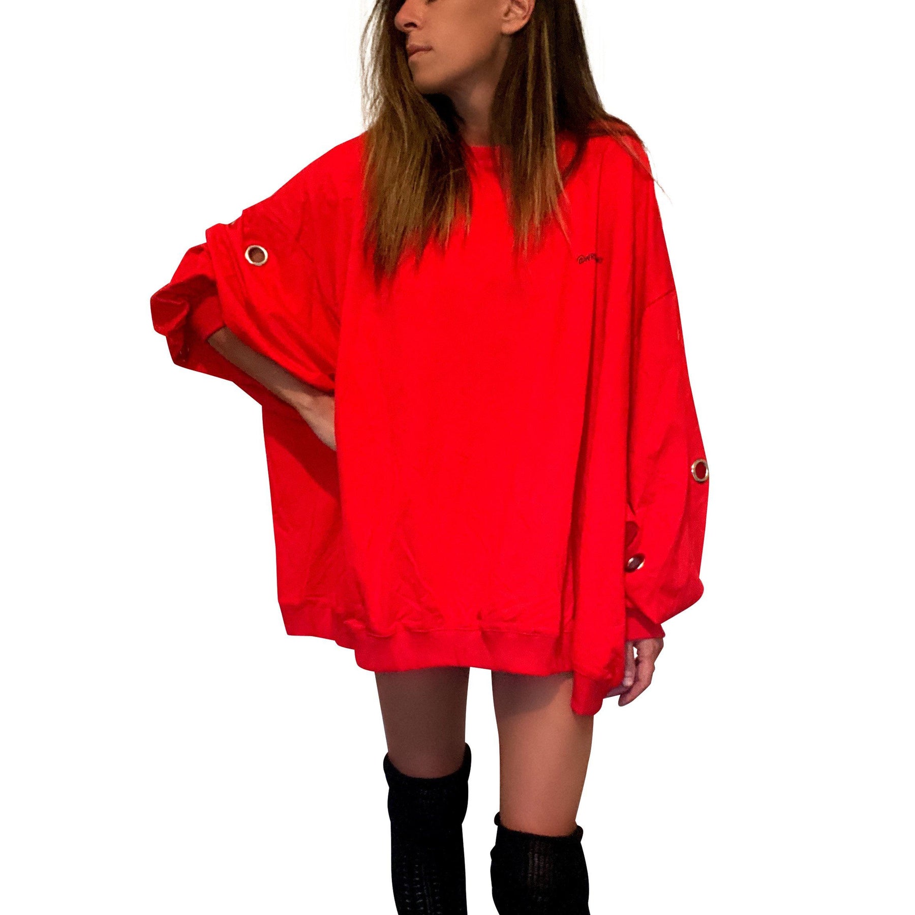 Oversized, batwing red sweatshirt with rings on sleeves. UGLY CHRISTMAS SWEATER painted on the back in black, with green paint drips coming from letters. Signed @wrenandglory