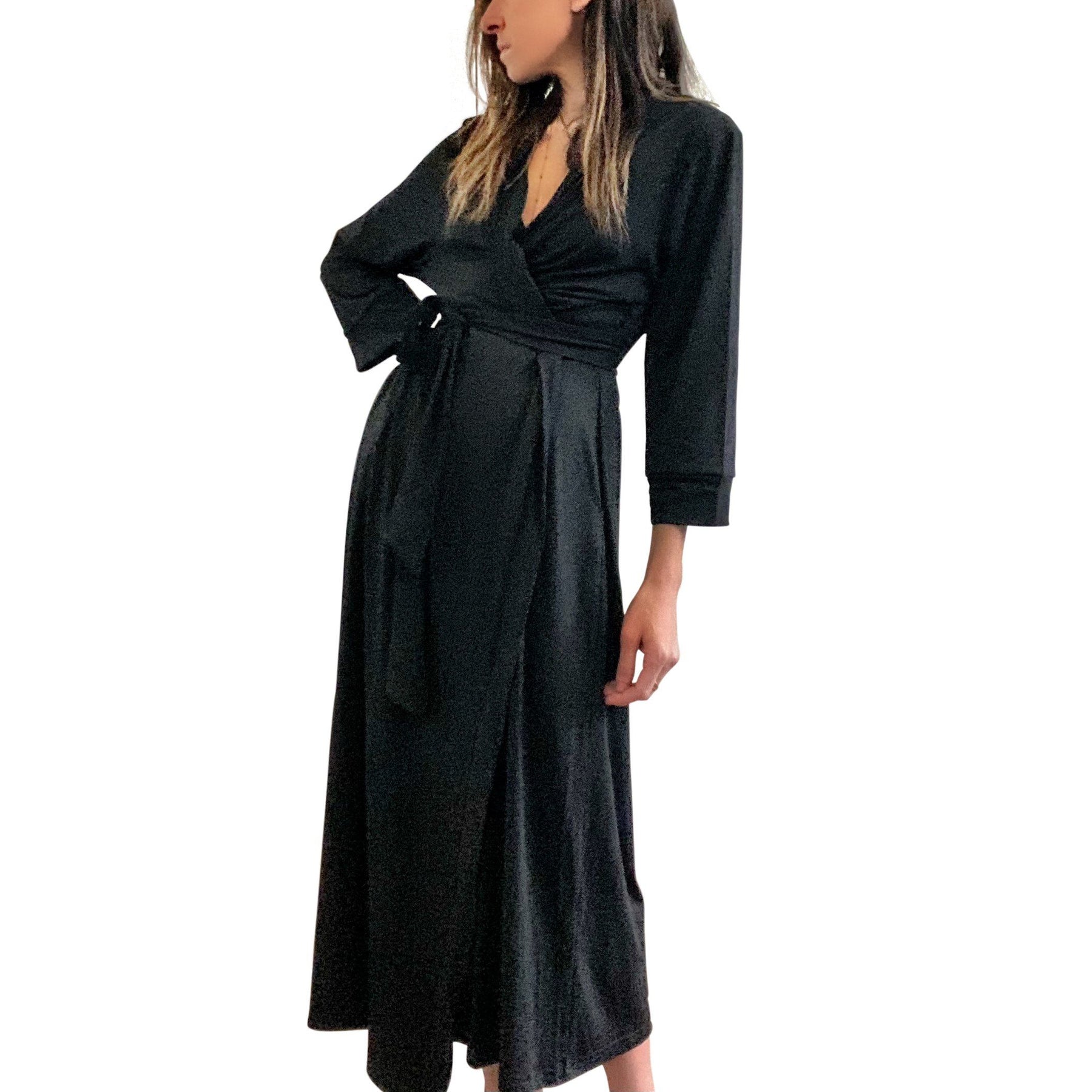 Black, super soft, stretch cotton. robe. LE TIRED painted on the back in gold. Belted, with inside ties for secure closure. Signed @wrenandglory.