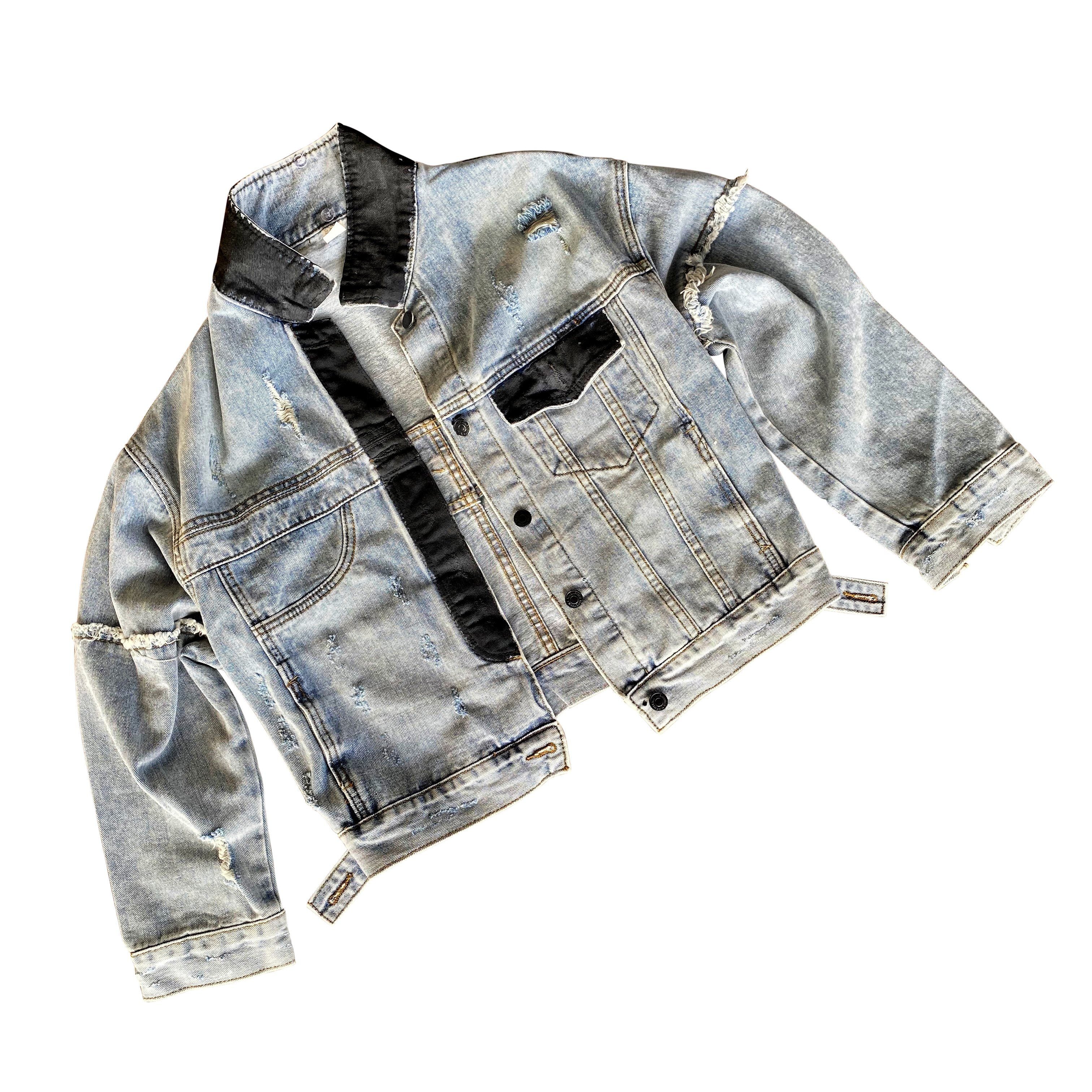 Lighter blue denim wash. White circle, painted MADE IN NYC inside in black. Pockets and hems painted black Signed @wrenandglory.