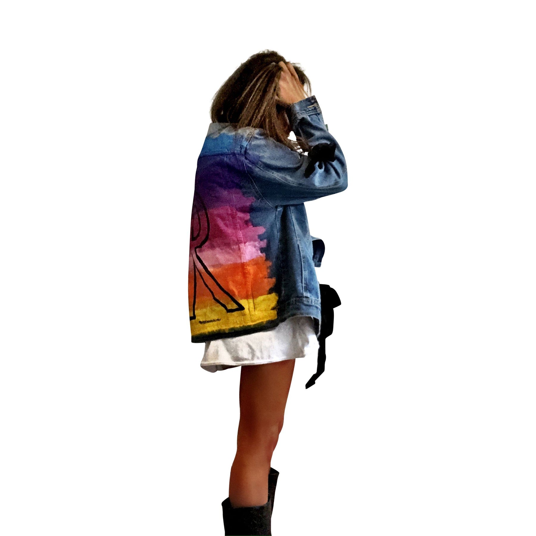 Dark blue denim wash, with velvert ribbon threaded through arms and front, lower left side. Ombre of colored striped on back, with large black initial painted in open block font over the colors. 'BE THE MAGIC' painted on color in black. Please specify initial above. Signed @wrenandglory.