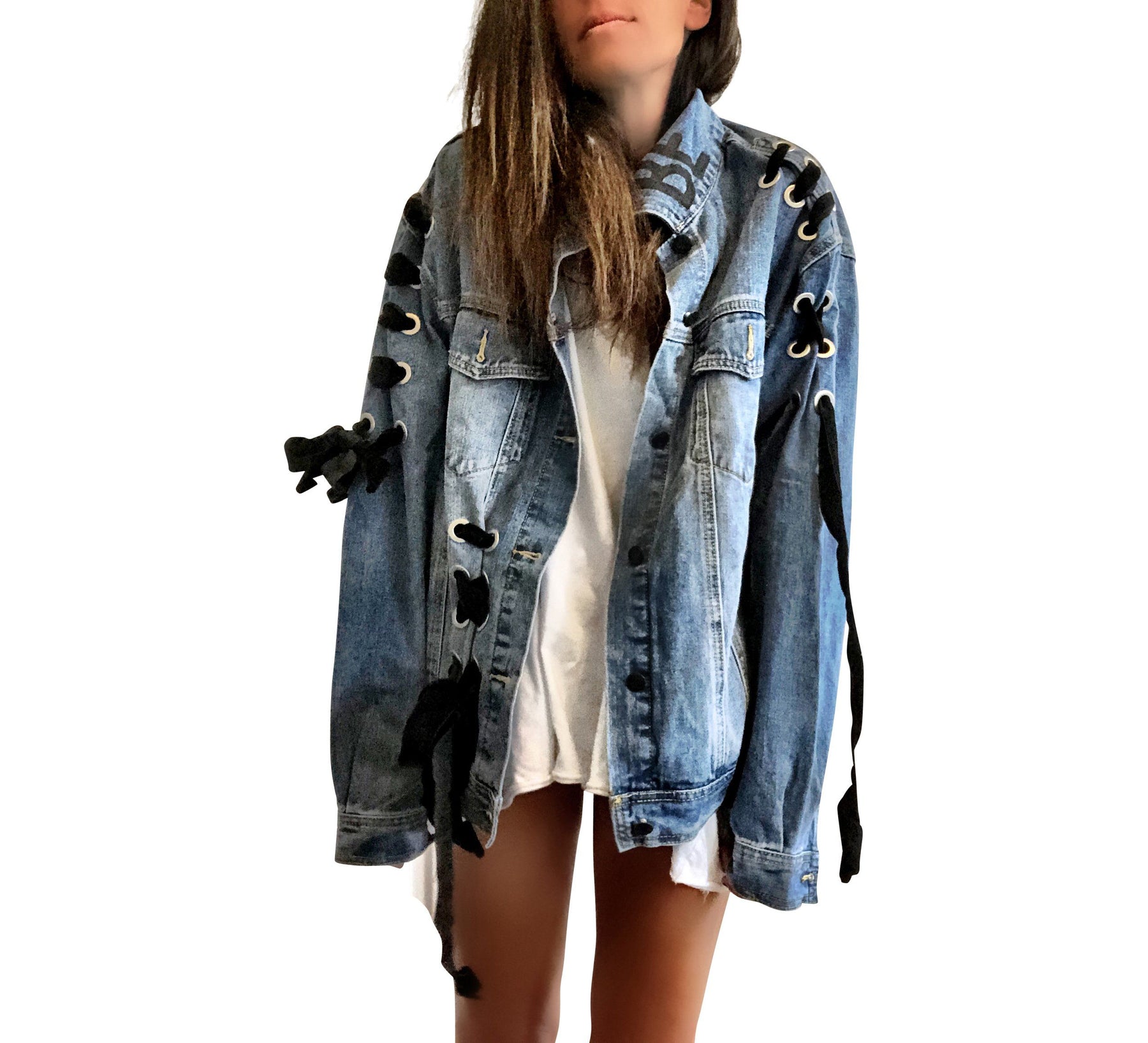 Dark blue denim wash, with velvert ribbon threaded through arms and front, lower left side. Ombre of colored striped on back, with large black initial painted in open block font over the colors. 'BE THE MAGIC' painted on color in black. Please specify initial above. Signed @wrenandglory.