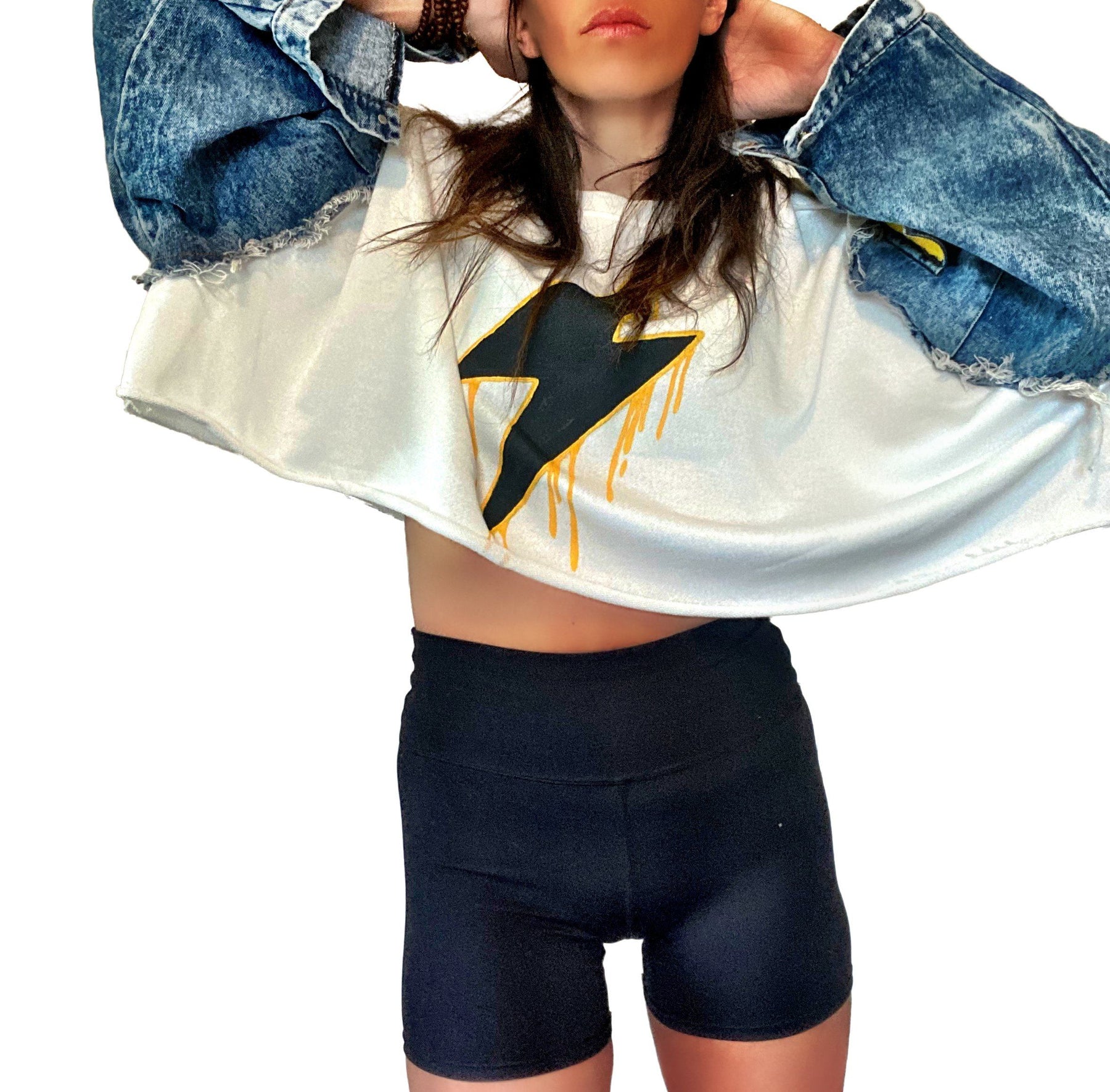 Cropped sweatshirt with denim sleeves. Large lightning painted in black, with yellow drip effect. Yellow painted on pockets on sleeves. Lightning side can be worn on the front or on the back. Signed @wrenandglory.