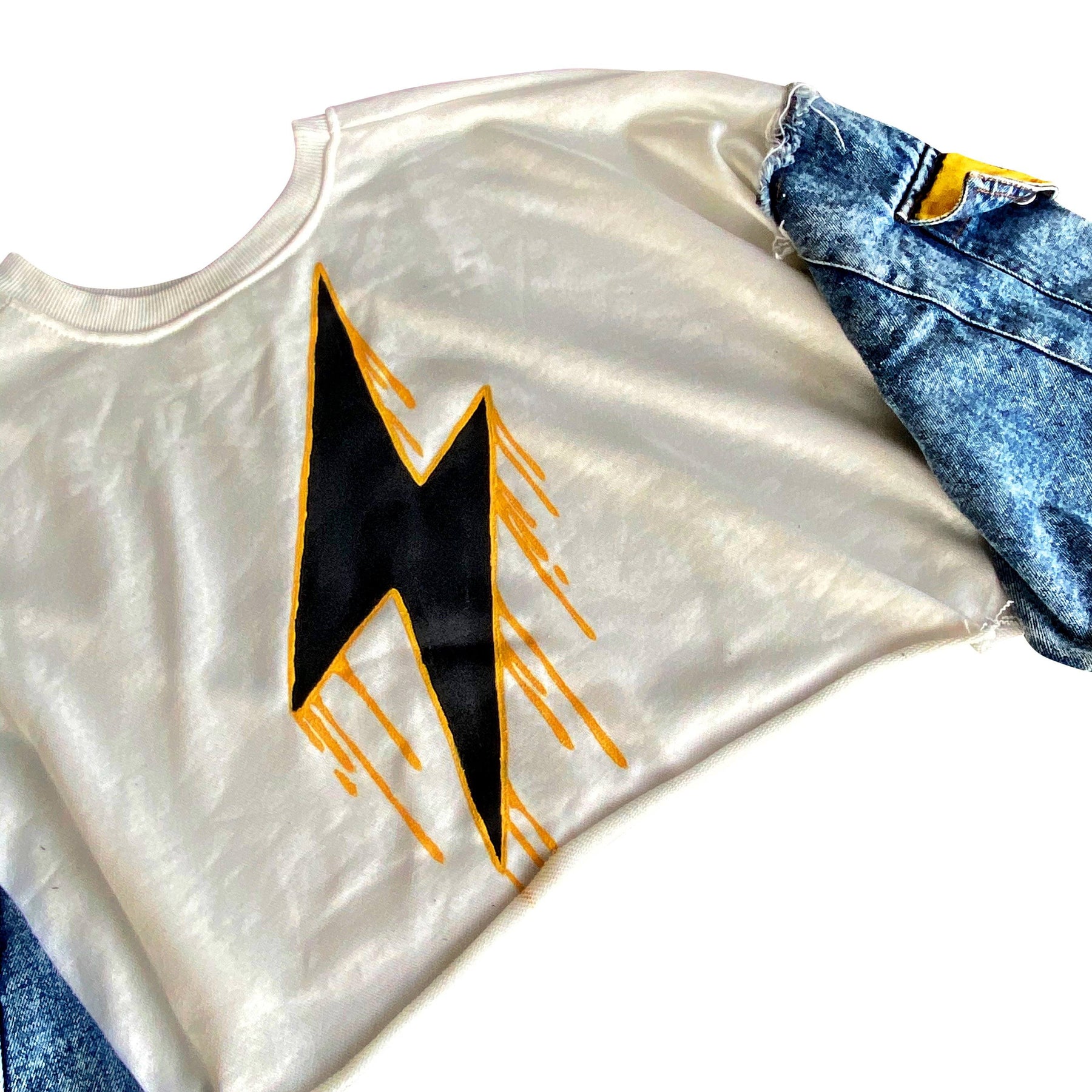 Cropped sweatshirt with denim sleeves. Large lightning painted in black, with yellow drip effect. Yellow painted on pockets on sleeves. Lightning side can be worn on the front or on the back. Signed @wrenandglory.