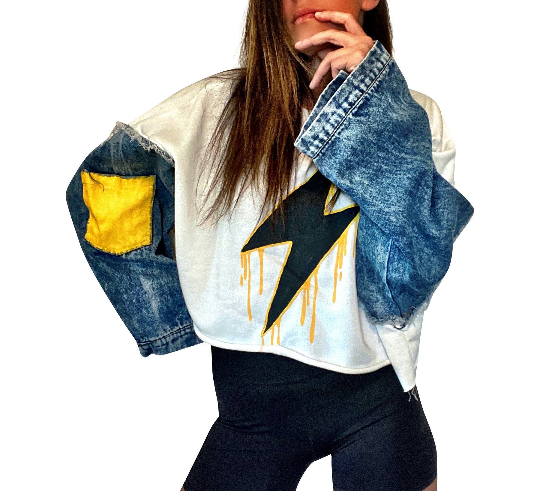 Cropped sweatshirt with denim sleeves. Large lightning painted in black, with yellow drip effect. Yellow painted on pockets on sleeves. Lightning side can be worn on the front or on the back. Signed @wrenandglory.