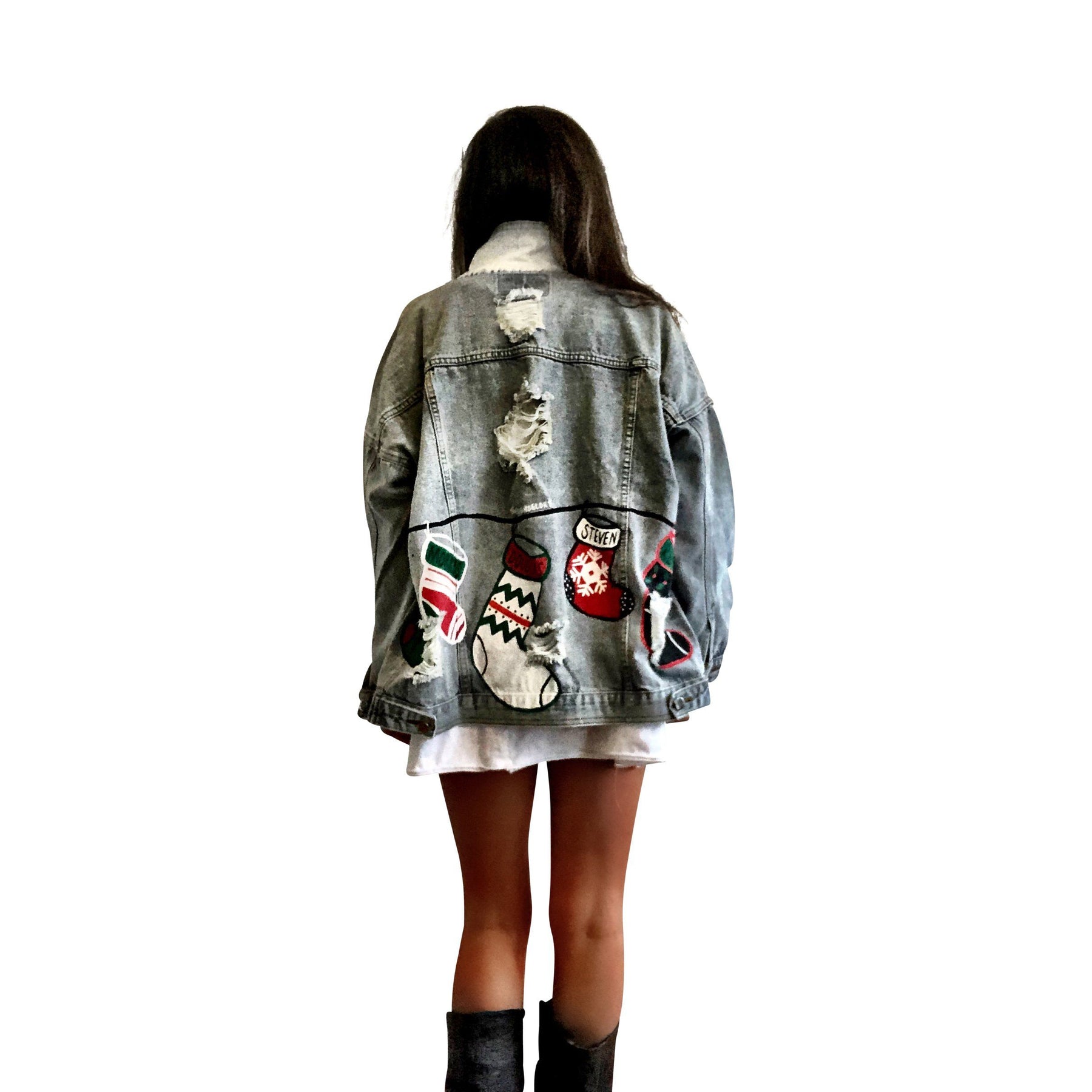 Medium blue denim wash. Christmas stockings painted across back, customized with the family member's name on each stocking. Amount of stocking depending on how many family members. Can fit up to 8 stockings. Please specify names above. Color and front pockets painted white. Signed @wrenandglory.