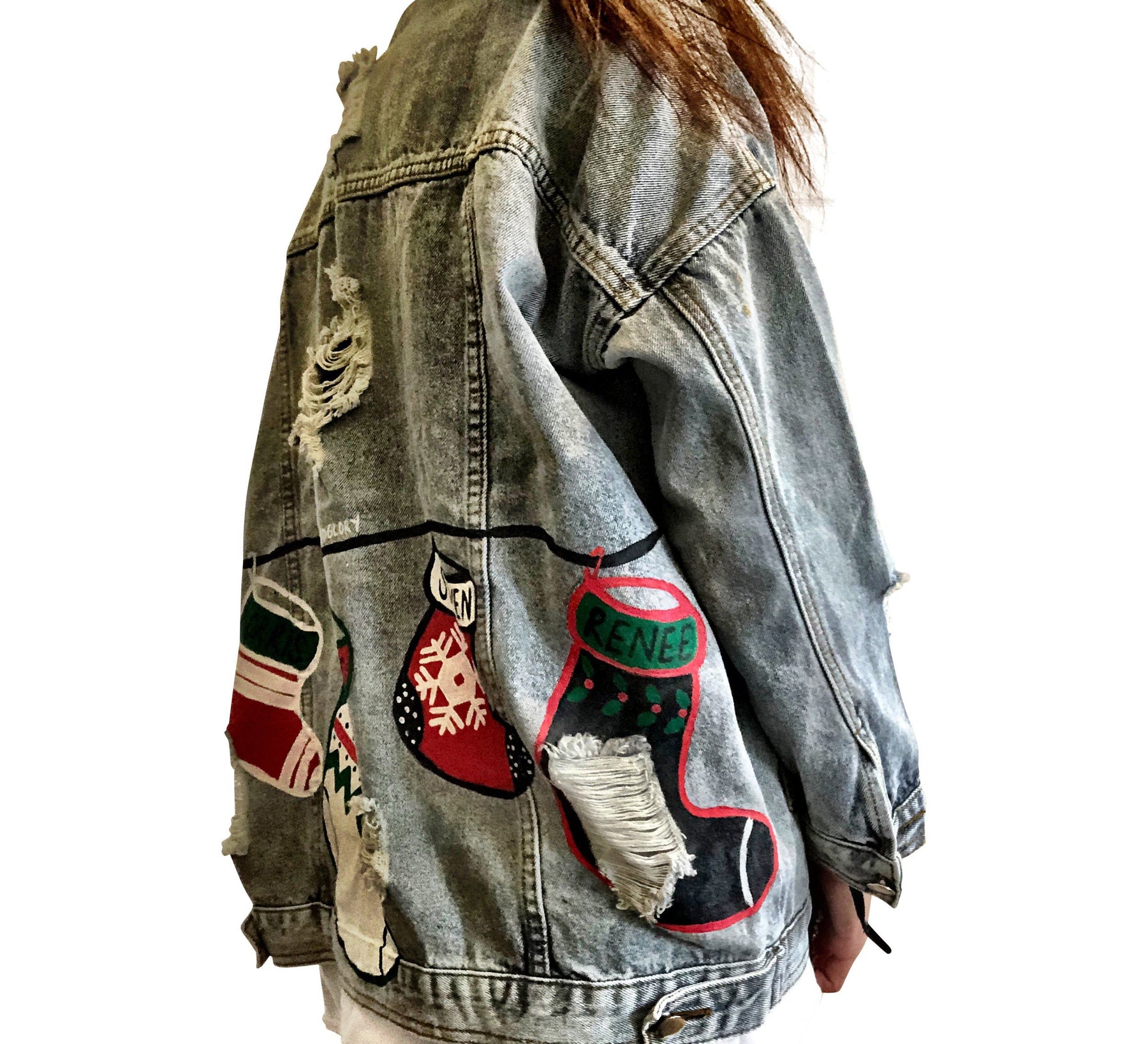 Medium blue denim wash. Christmas stockings painted across back, customized with the family member's name on each stocking. Amount of stocking depending on how many family members. Can fit up to 8 stockings. Please specify names above. Color and front pockets painted white. Signed @wrenandglory.