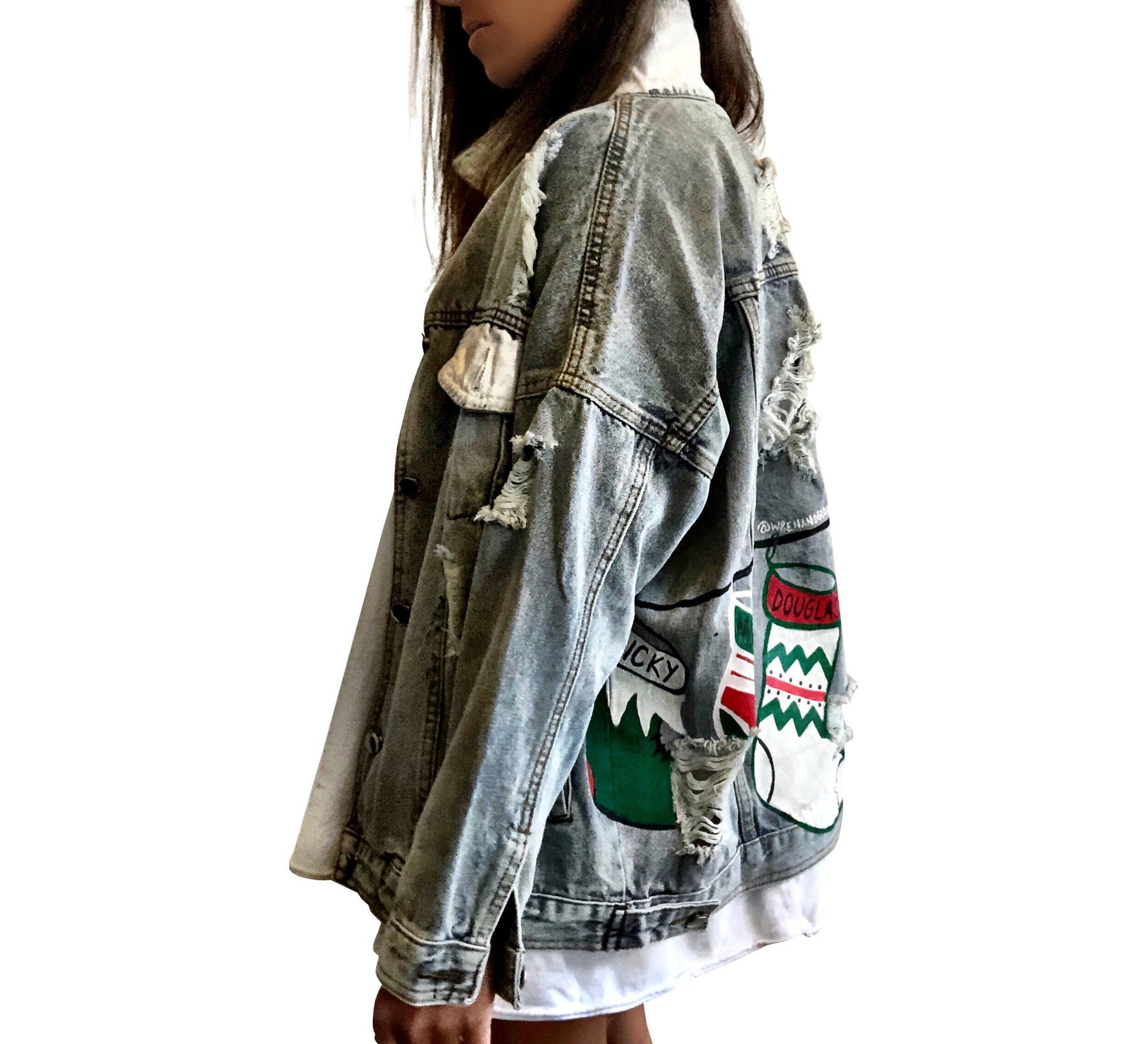 Medium blue denim wash. Christmas stockings painted across back, customized with the family member's name on each stocking. Amount of stocking depending on how many family members. Can fit up to 8 stockings. Please specify names above. Color and front pockets painted white. Signed @wrenandglory.