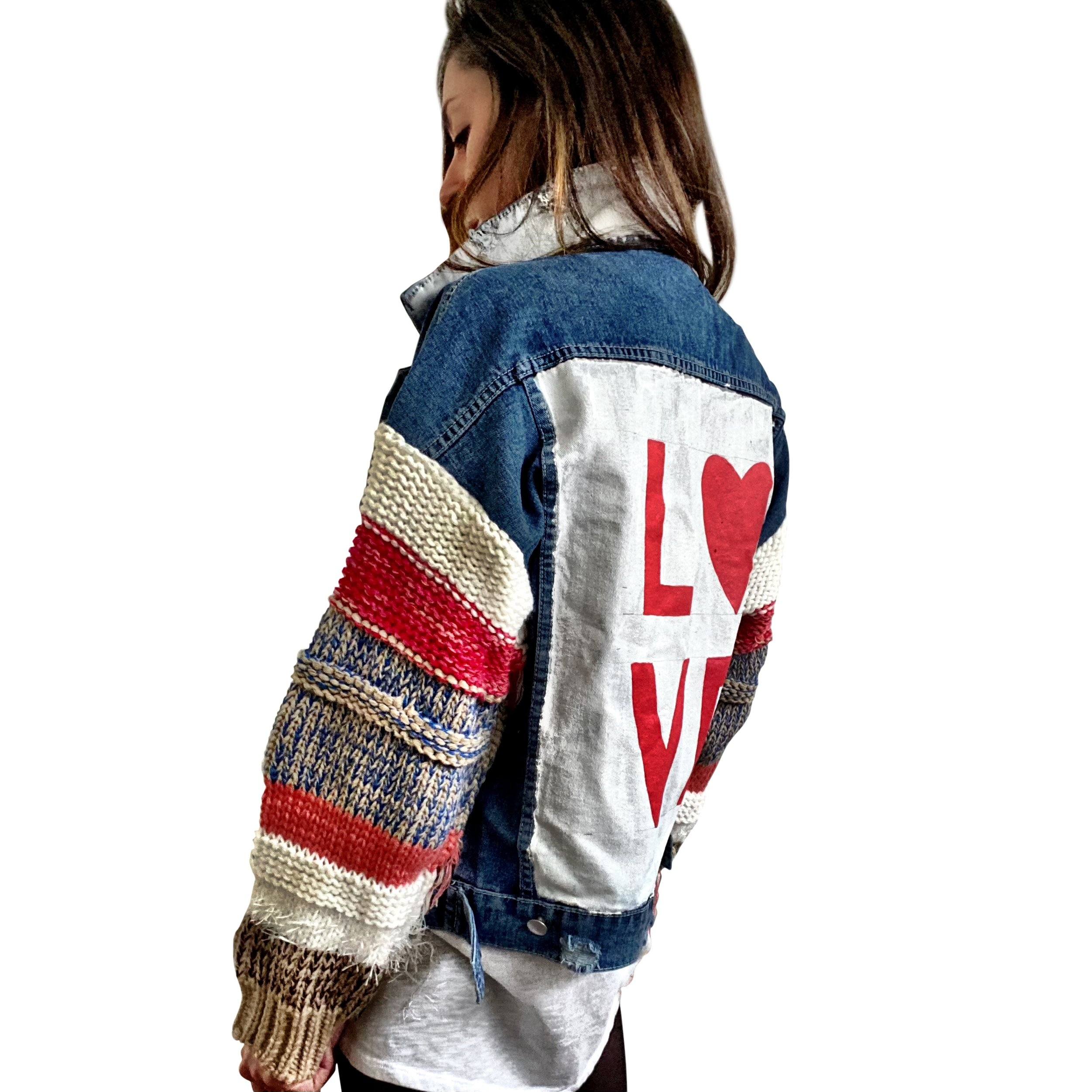 Dark blue denim jacket with super comfortable knit sleeves. White base on back, with LOVE painted over in red, with a heart Signed @wrenandglory.