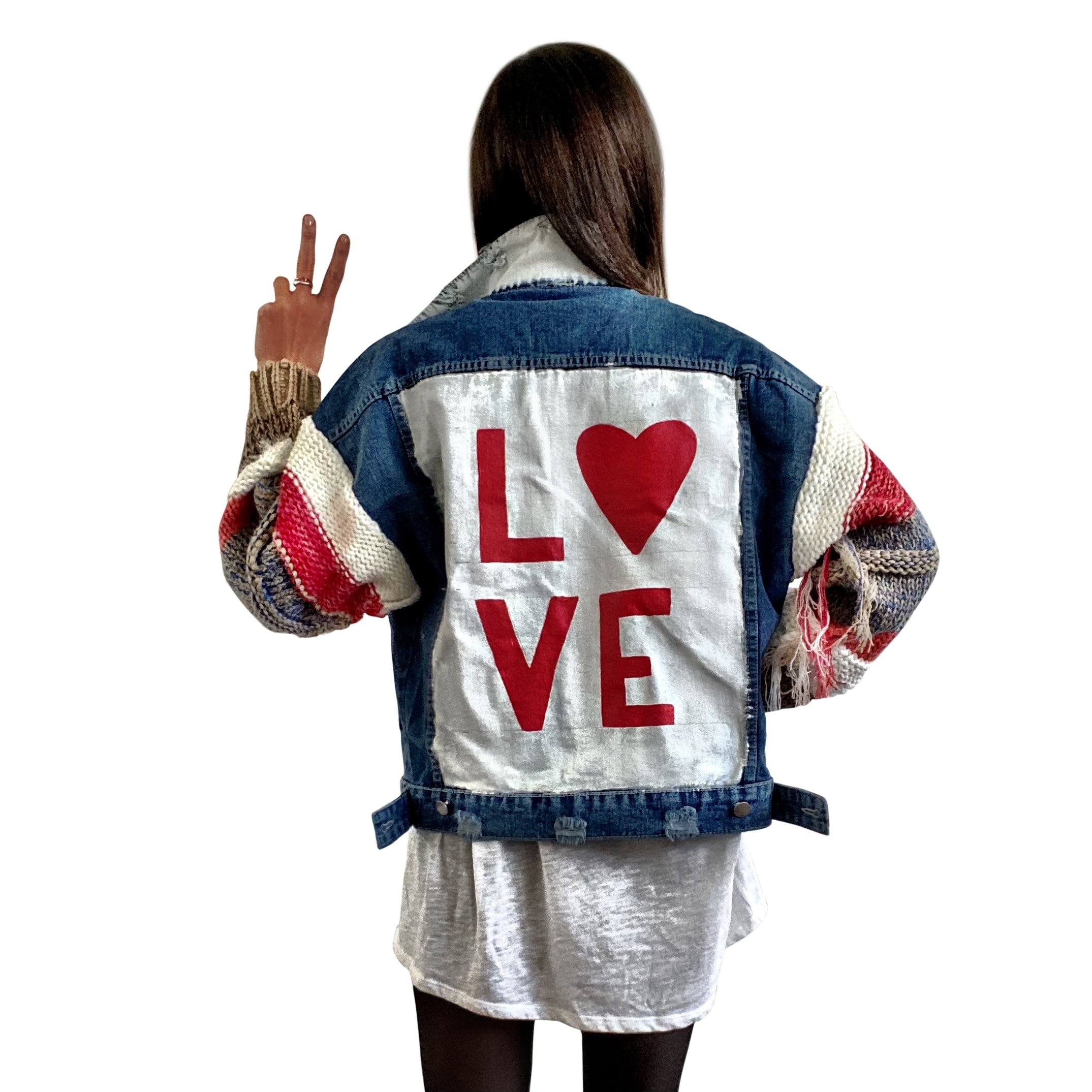 Dark blue denim jacket with super comfortable knit sleeves. White base on back, with LOVE painted over in red, with a heart Signed @wrenandglory.