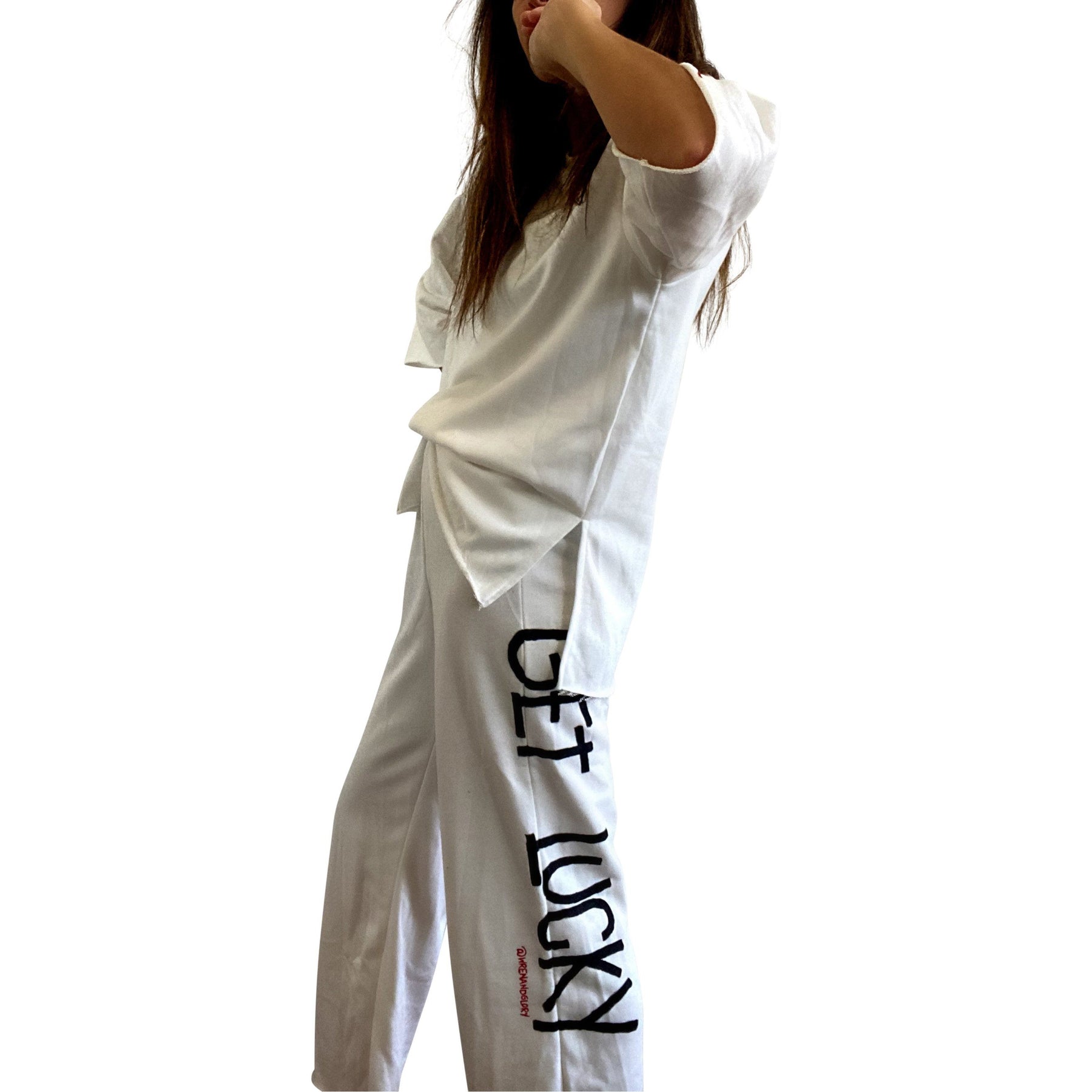 The perfect white sweatshirt & sweatpant loungewear set. Large cherries painted on back of sweatshirt, with GET LUCKY painted in black down leg of pant. Signed @wrenandglory on both top and bottom.