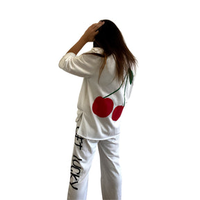 The perfect white sweatshirt & sweatpant loungewear set. Large cherries painted on back of sweatshirt, with GET LUCKY painted in black down leg of pant. Signed @wrenandglory on both top and bottom.