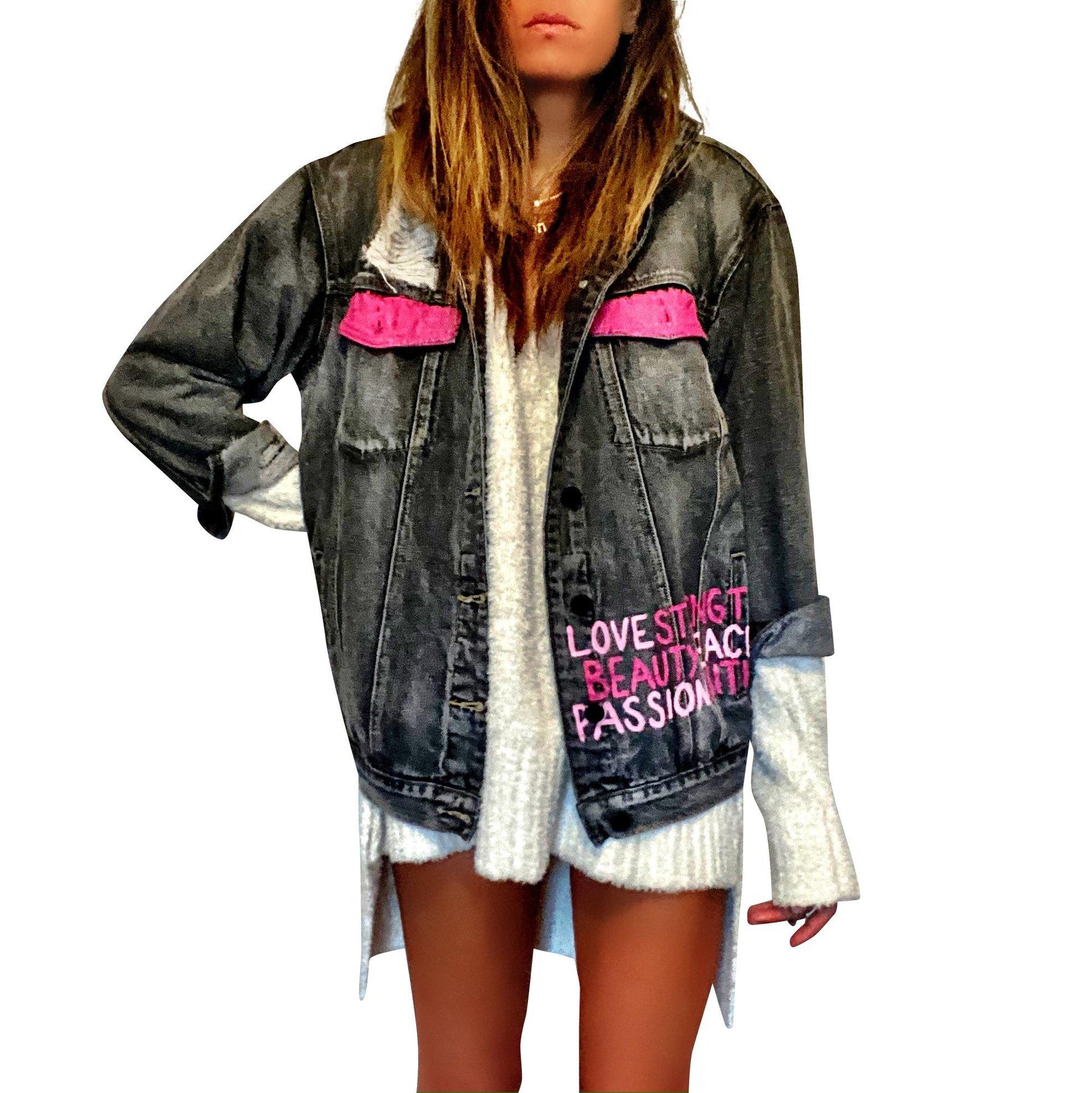 Faded black denim. Pink ombre Breast Cancer ribbon painted in large on back. Love, Strength, Trust, Beauty, Peace, Hope, Passion, Faith, Power painted in light & bright pink on the front. Collar painted in pink ombre. Signed @wrenandglory.