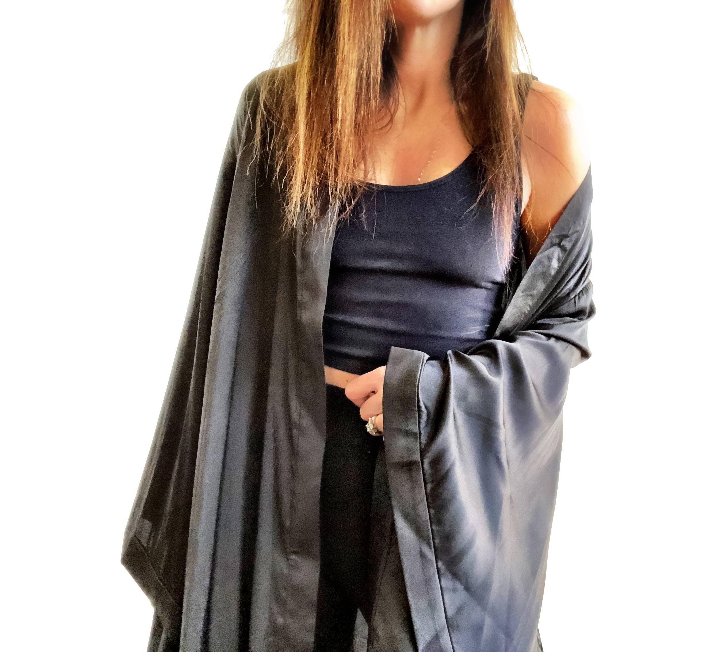 Black, super soft, satin long kimono robe. Pair of cherries painted in back in in red and green. Belted, with bell sleeves. Signed @wrenandglory.