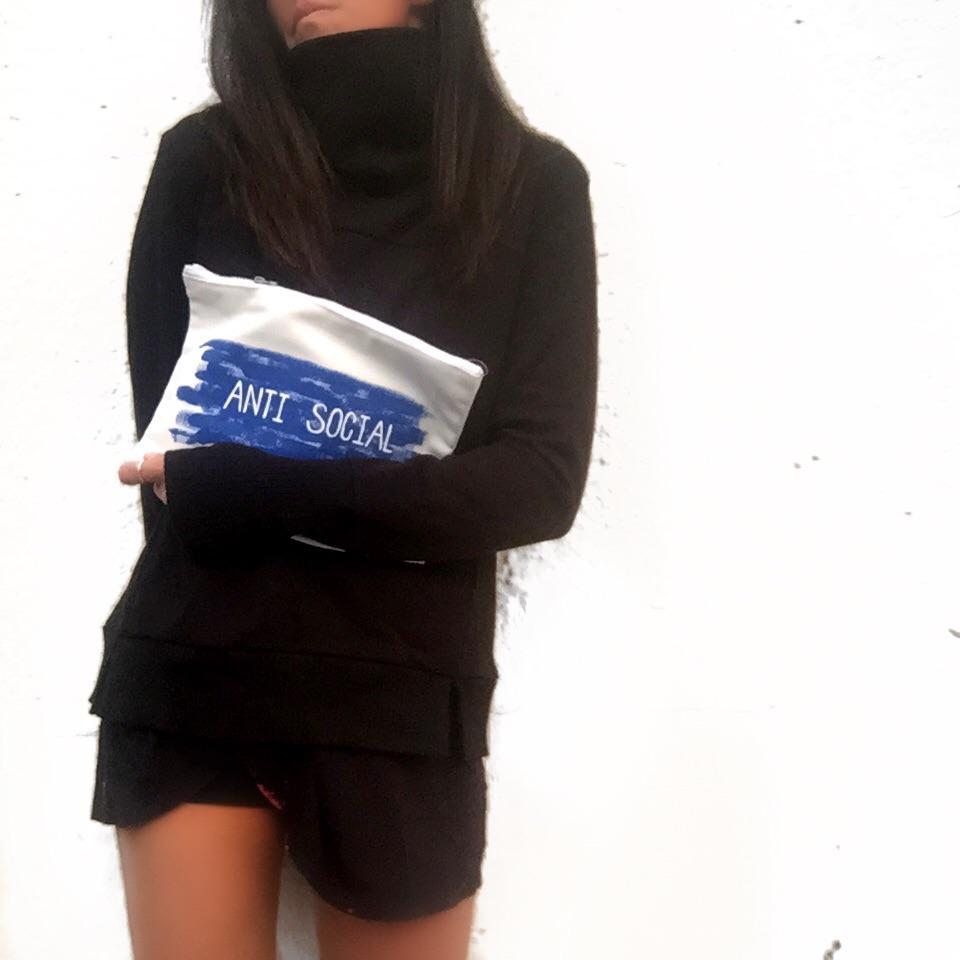 White denim zippered pouch. Hand painted 'ANTI SOCIAL' design. Signed @wrenandglory.