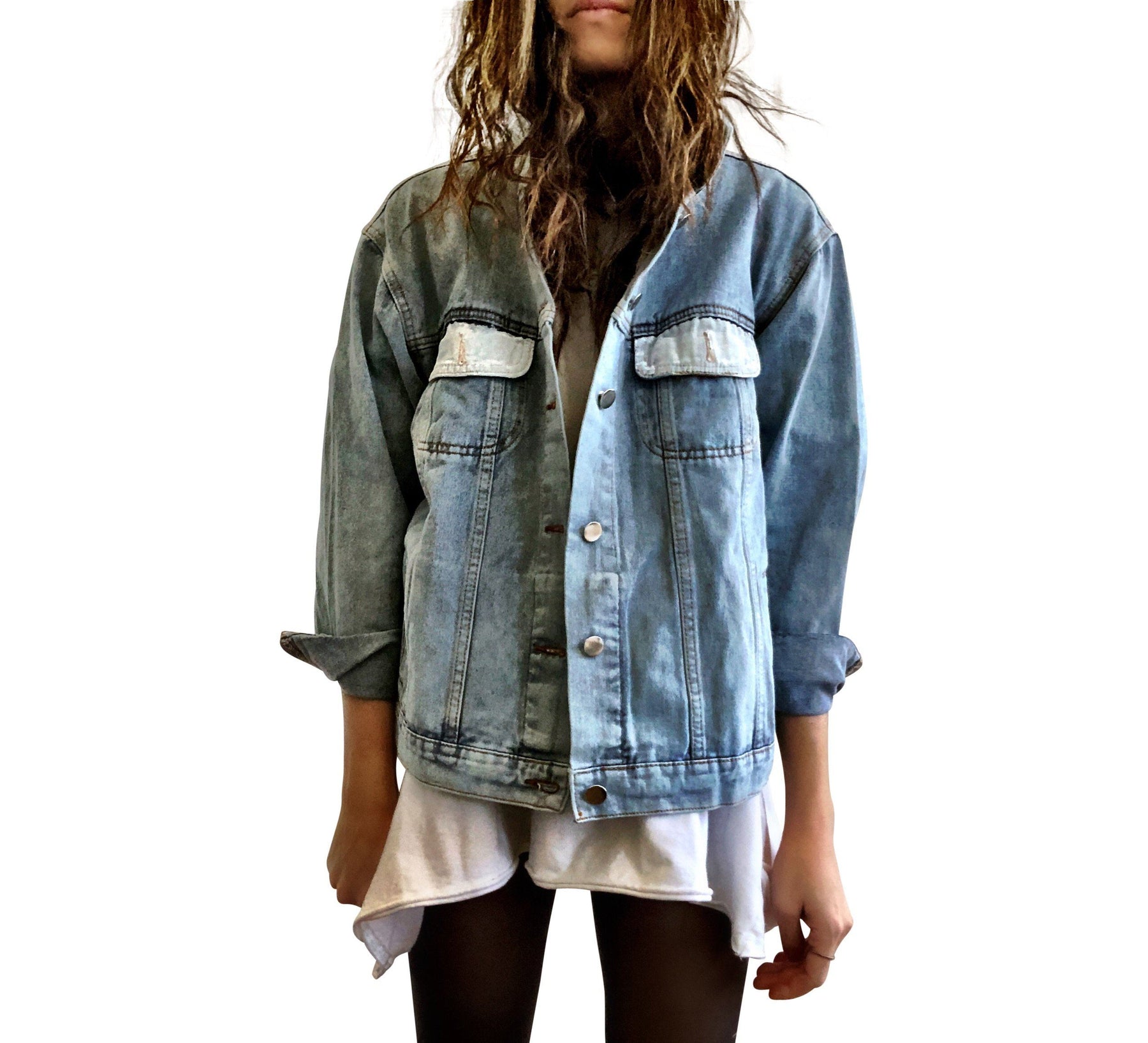 Lighter blue denim wash. Large white heart on back with MAMA painted inside in black. Smaller black hearts surrounding the larger one, customized with kids names. Collar and front pockets painted white. Signed @wrenandglory.