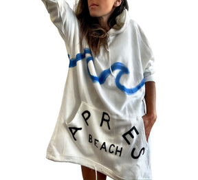 Oversized white sweatshirt dress. Blue wave painted along entire sweatshirt, on chest area, with APRES BEACH painted in black on front pocket. Signed @wrenandglory.