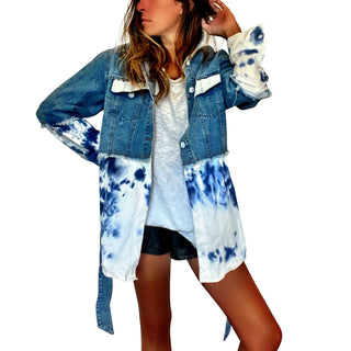 Blue denim, with white cotton along bottom half and bottom of sleeves. Blue tie dye pattern on white portion. Collar and front pockets painted white. Signed @wrenandglory.