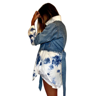 Blue denim, with white cotton along bottom half and bottom of sleeves. Blue tie dye pattern on white portion. Collar and front pockets painted white. Signed @wrenandglory.