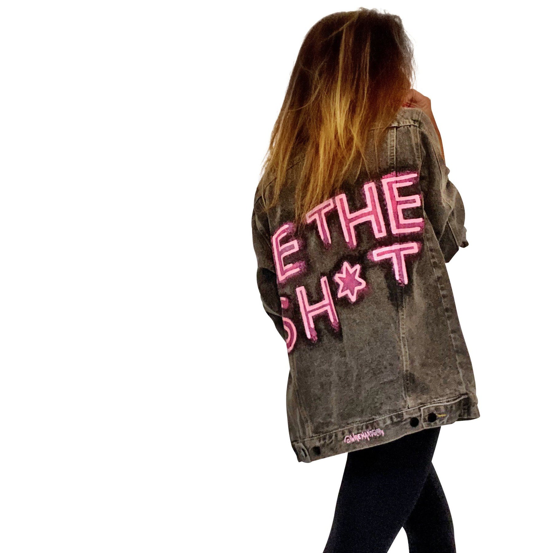 Faded black denim. BE THE SH*T logo painted on back in neon effect in bright pink. Collar and front pockets painted white. Signed @wrenandglory.
