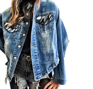 Dark blue denim jacket with long back. White and black pattern painted on back, with ART SCHOOL DROPOUT painted over it in white. Collar and front pockets painted with black and white pattern. Signed @wrenandglory.