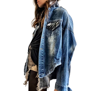 Dark blue denim jacket with long back. White and black pattern painted on back, with ART SCHOOL DROPOUT painted over it in white. Collar and front pockets painted with black and white pattern. Signed @wrenandglory.