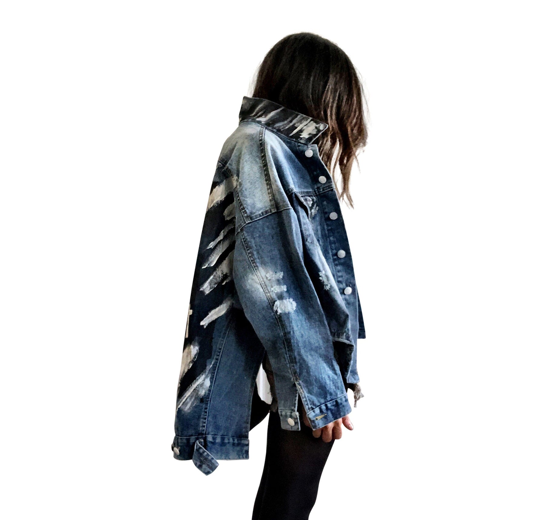 Dark blue denim jacket with long back. White and black pattern painted on back, with ART SCHOOL DROPOUT painted over it in white. Collar and front pockets painted with black and white pattern. Signed @wrenandglory.