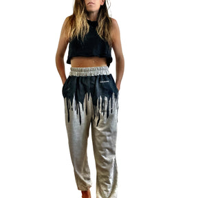 The perfect gray jogger sweat pant. Black painted around entire top on sweat pant, with drip effect. Signed @wrenandglory.