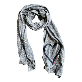 Lightweight scarf, that can also be used as a soft face covering. Heart painted at the bottom in black