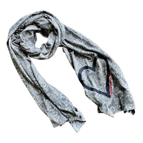 Lightweight scarf, that can also be used as a soft face covering. Heart painted at the bottom in black.