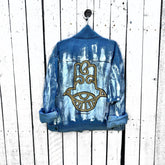 Medium blue denim wash. 'White base all over, with black and gold Hamsa painted on the back. Signed @wrenandglory.