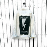 White denim wash. 'Damn The Man Save The Empire' in black and white. Signed @wrenandglory.