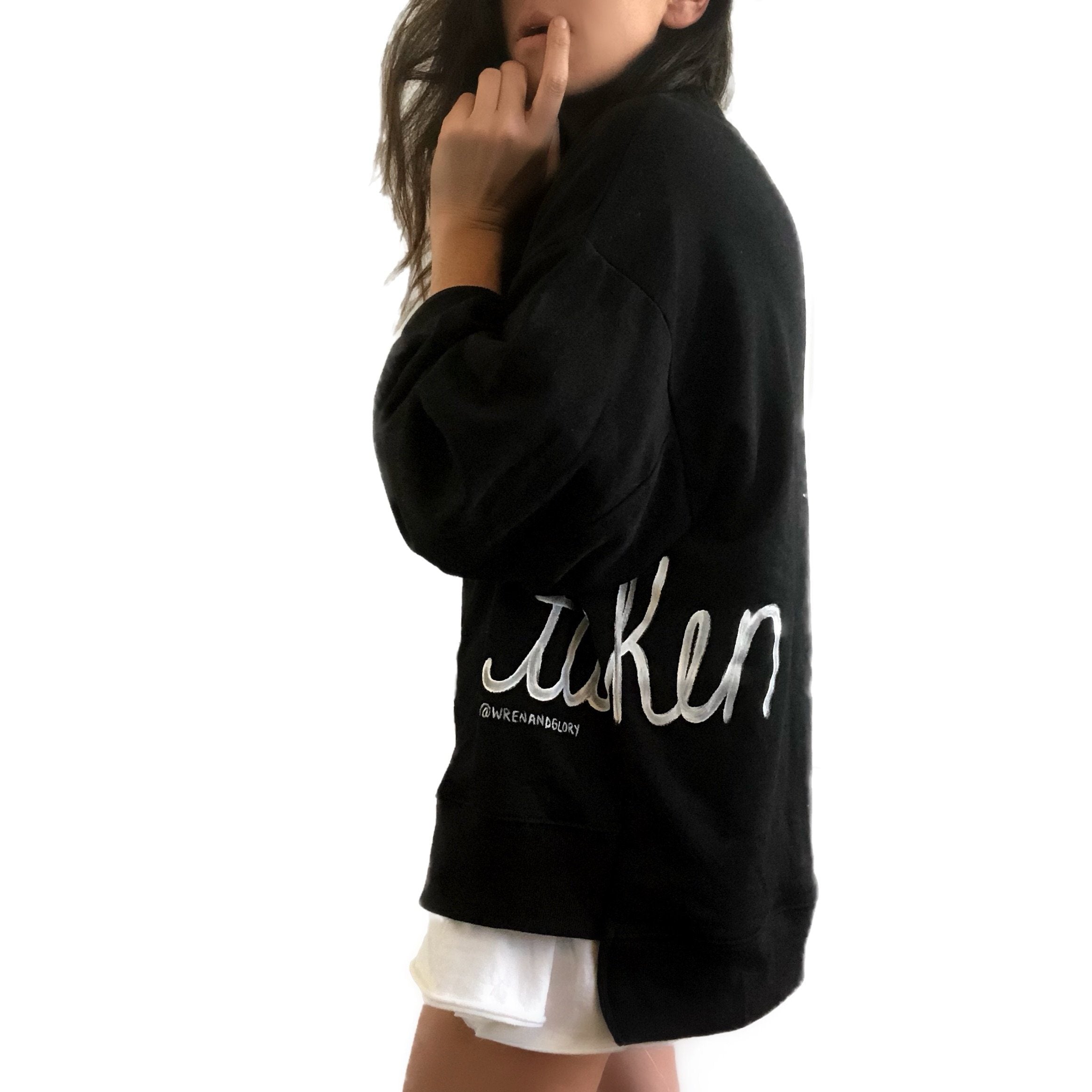 'TAKEN' PAINTED SWEATSHIRT
