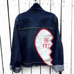 Medium blue denim wash. Broken hearts, one on each jacket, with BEST FRIENDS split up between the 2 jackets. White stripes on diagonal on fronts, pockets painted white. Signed @wrenandglory.