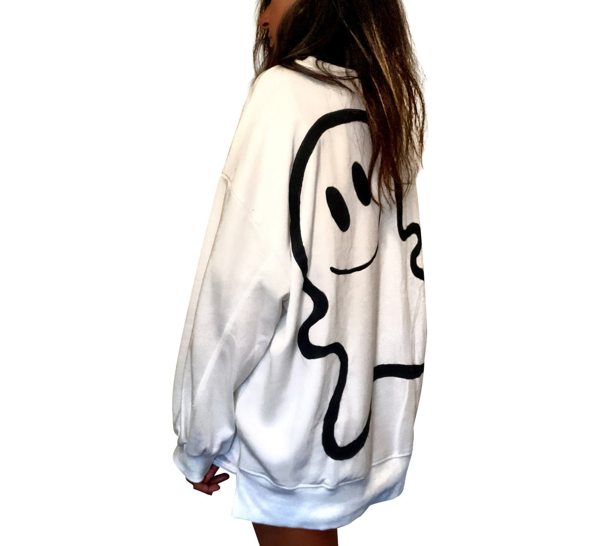 Oversized white sweatshirt. Silhouette of ghost painted in black on back, with BOO painted on front upper side. Signed @wrenandglory.