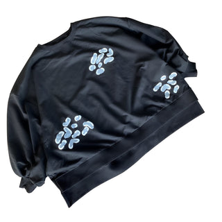 Oversized black crewneck sweatshirt. Panther pattern painted throughout in gray and white. Signed @wrenandglory.