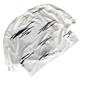 Oversized white crewneck sweatshirt. Zebra pattern painted throughout in black. Signed @wrenandglory.