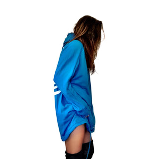 Oversized blue sweatshirt dress. Silhouette of angel painted in black on back, with ANGEL painted on front upper side. Signed @wrenandglory.