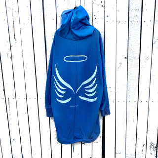 Oversized blue sweatshirt dress. Silhouette of angel painted in black on back, with ANGEL painted on front upper side. Signed @wrenandglory.