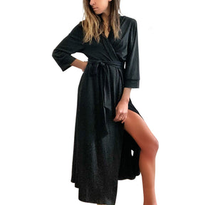 Black, super soft, stretch cotton. robe. LE TIRED painted on the back in gold. Belted, with inside ties for secure closure. Signed @wrenandglory.