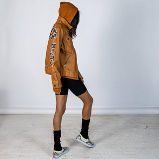 Tan, faux leather jacket with Brown hooded sweatshirt lining the inside and thumbholes at sleeves. 'F*CK DRAMA LET'S PARTY' painted along back of sleeves and upper back of jacket, in black, with white outline. Signed @wrenandglory.