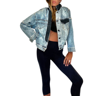 Lighter blue denim wash. White circle, painted MADE IN NYC inside in black.  Pockets and hems painted black Signed @wrenandglory.