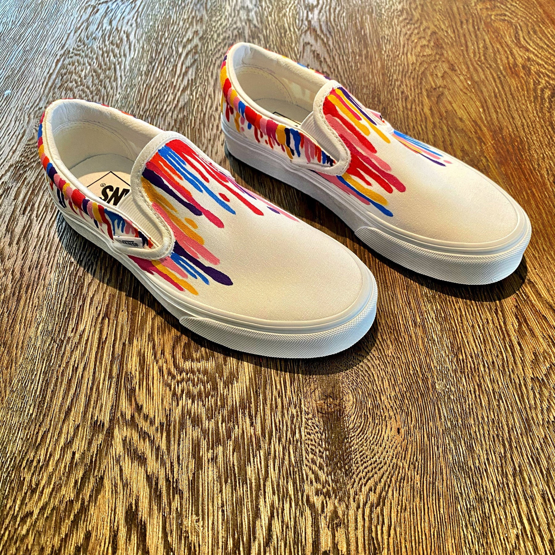 Painted on White Vans Classic Slip-On Assorted colors painted in heavy drip effect across entire sneaker. Signed @wrenandglory. 