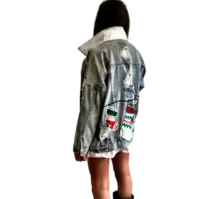 Medium blue denim wash. Christmas stockings painted across back, customized with the family member's name on each stocking. Amount of stocking depending on how many family members. Can fit up to 8 stockings. Please specify names above. Color and front pockets painted white. Signed @wrenandglory.